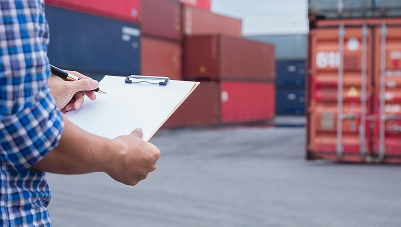 Man in a shipping yard